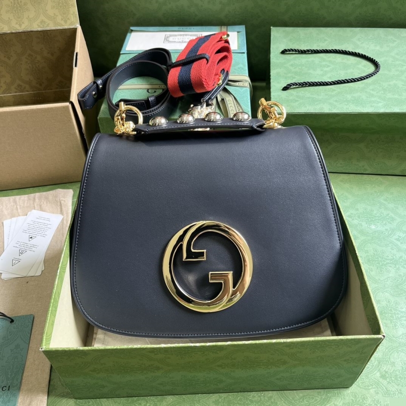 G*u*i top handle bags